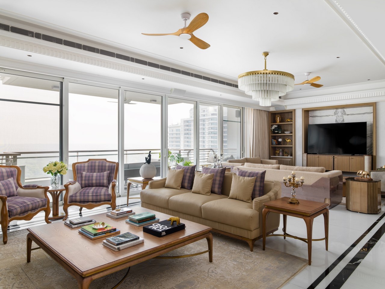 Living room framed by full-height glazing
