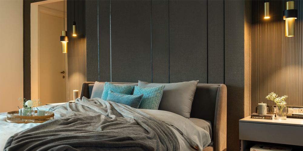Bedroom with layered timber and lamplight