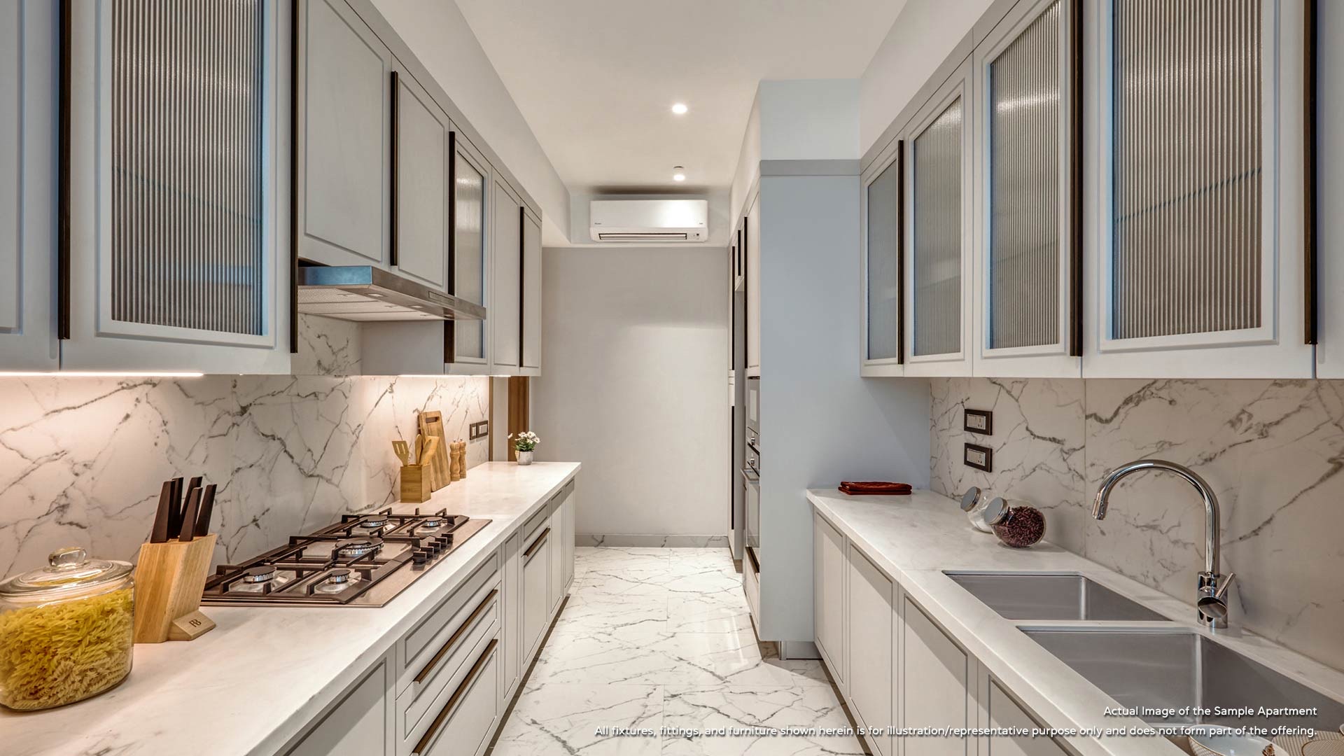 Galley kitchen in marble and fluted glass