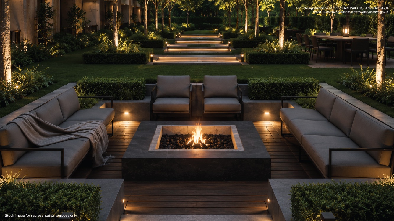 Sunken fire-pit lounge lined with lanterns