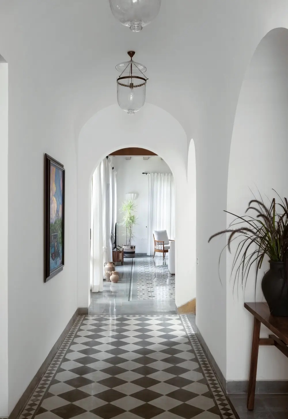 Arched corridor with checkerboard floor (La Branca, representative)