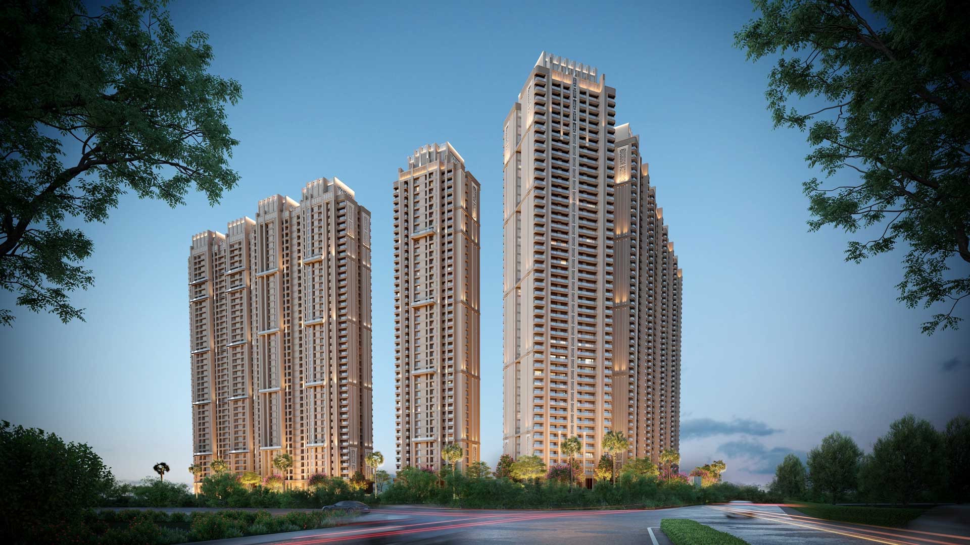 Westin Residences towers at dusk from a tree-lined approach